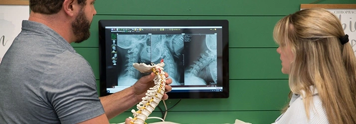 Chiropractor Suwanee GA Josh Hasty With X-Ray